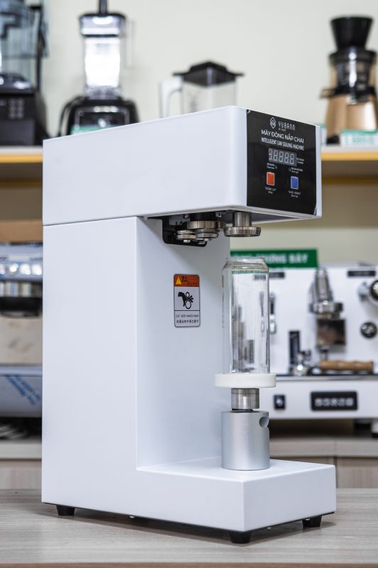 Máy đóng nắp chai